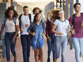 Students walking down a hallway