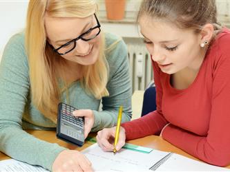 Girl and teacher doing homework