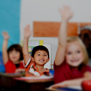 3 students raising their hands